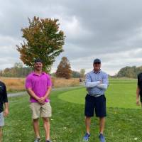 Alumni on golf course